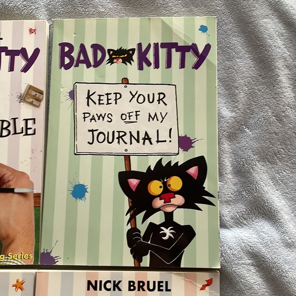 Bad kitty book lot-7 books and 1 journal. First page of journal has some writing - Picture 5 of 11